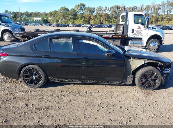 WBA13BK07PCN56512 2023 BMW M5 Черный Вид задней части салона