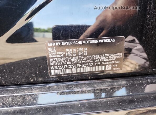 WBA5U7C09LFH62582 2020 BMW M3 Black Vista del compartimento del motor