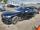 2019 Bmw M760 Xi Black vin: WBA7H6C5XKG615146