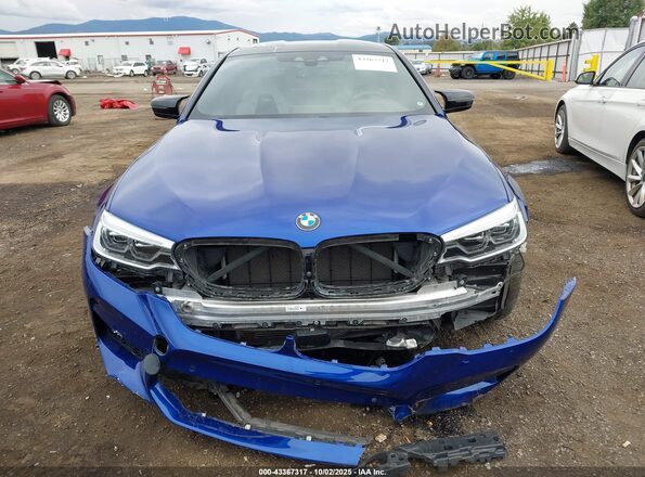 WBSJF0C54KB448333 2019 BMW M5 Blue Vista interior trasera