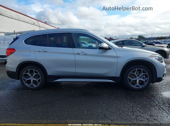 WBXHT3C58K5L38659 2019 BMW X1 Серый Вид задней части салона