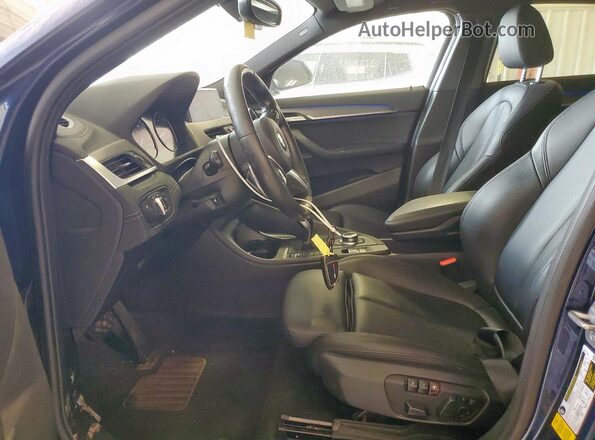 WBXYH9C09L5P06485 2020 BMW X2 Blue Vista interior delantera