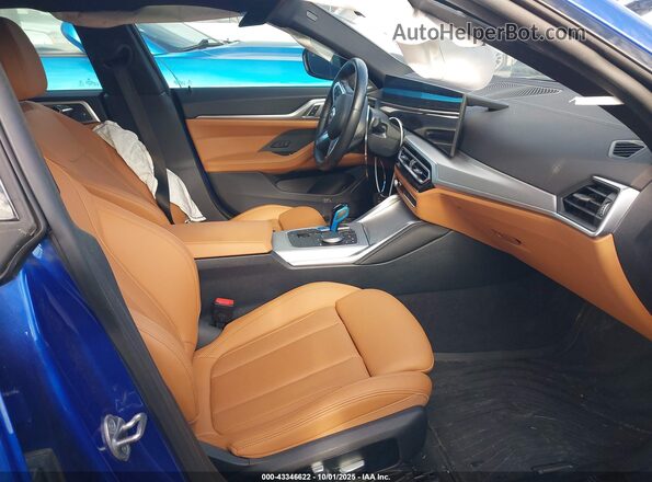 WBY73AW04PFN50536 2023 BMW I4 Blue Vista interior delantera