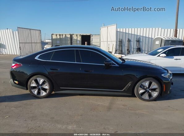 WBY73AW09PFR30259 2023 BMW I4 Black Widok wnętrza z tyłu