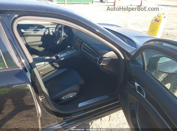WP0AA2A75GL001484 2016 PORSCHE PANAMERA Черный Вид салона спереди