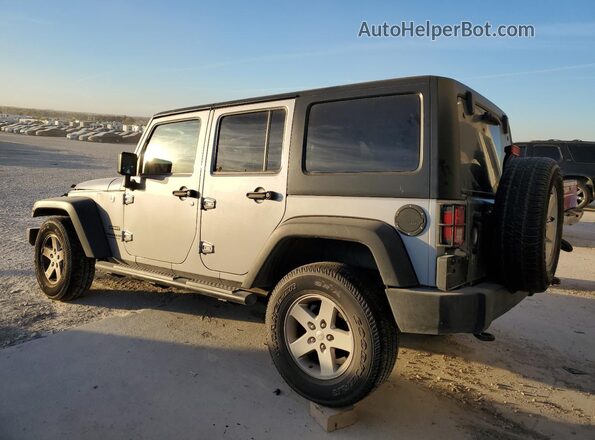 1C4BJWDG5GL138061 2016 JEEP WRANGLER Silver Trasero izquierdo