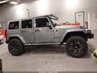 2016 Jeep Wrangler Unlimited Sahara Серый vin: 1C4HJWEG1GL186875