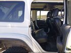 2024 Jeep Wrangler 4-door Sahara 4x4 Белый vin: 1C4PJXEN2RW103469