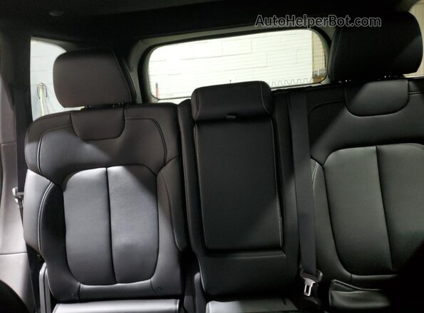 1C4RJHBGXSC330517 2025 JEEP GRAND Burgundy Rear seats view