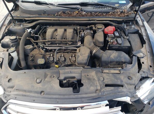 1FAHP2E89GG139981 2016 FORD TAURUS Черный Вид задней части салона