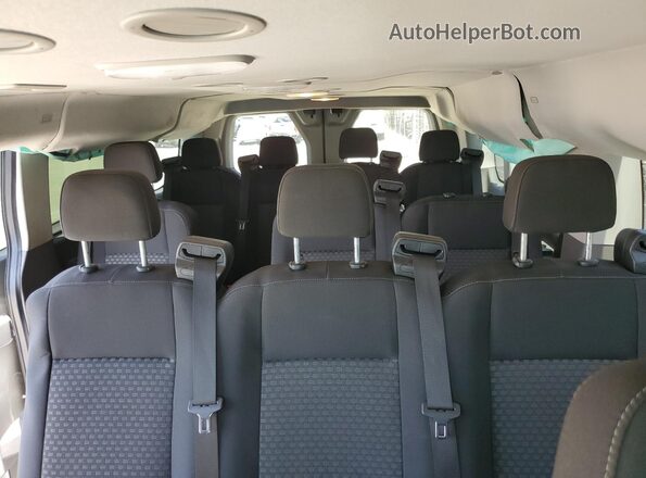 1FBAX2Y85LKB23277 2020 FORD PASSENGER White Vista de los asientos traseros