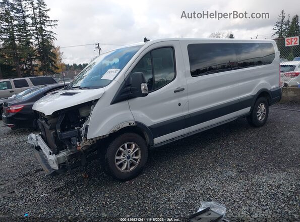 1FBAX2Y88MKA14992 2021 FORD PASSENGER Белый Передняя левая четверть
