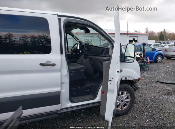 1FBAX2Y88MKA14992 2021 FORD PASSENGER Белый Вид салона спереди