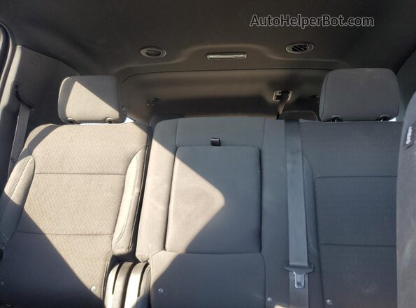 1GNSCBKD4RR253981 2024 CHEVROLET SUBURBAN White Rear seats view