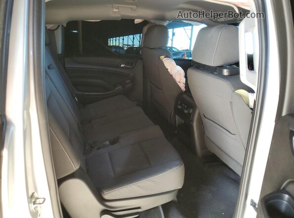 1GNSCGKC3KR264769 2019 CHEVROLET SUBURBAN Серебряный Вид задней части салона