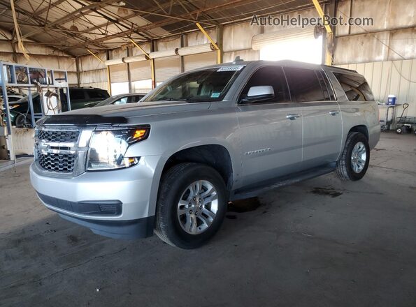 1GNSCGKC3KR264769 2019 CHEVROLET SUBURBAN Серебряный Передняя левая четверть