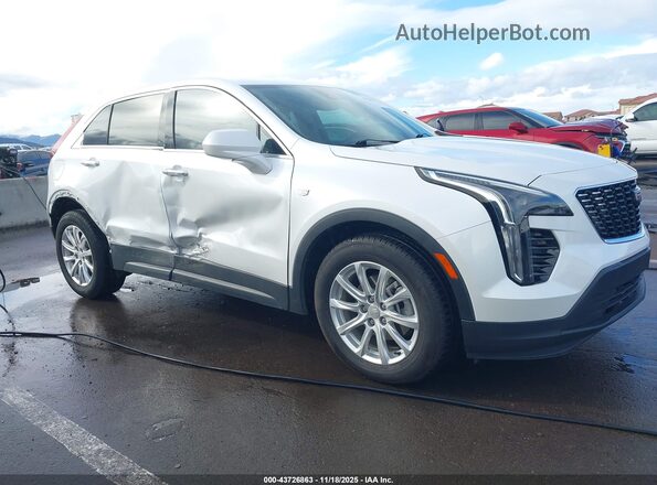 1GYAZAR49NF107519 2022 CADILLAC XT4 Белый Вид спереди
