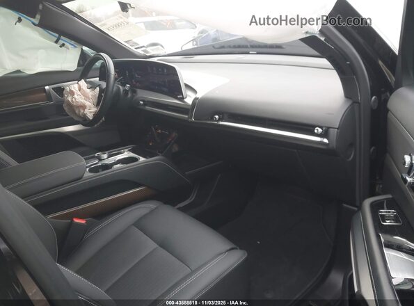 1GYC3NML9TZ700809 2026 CADILLAC VISTIQ Черный Вид салона спереди