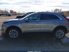 2024 Cadillac Xt4 Awd Premium Luxury Champagne vin: 1GYFZDR41RF202136
