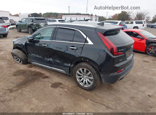 1GYFZDR42PF140792 2023 CADILLAC XT4 Black Tył lewy