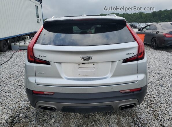 1GYFZDR45MF015877 2021 CADILLAC XT4 Серебряный Вид сзади