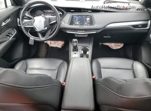 1GYFZDR45MF015877 2021 CADILLAC XT4 Серебряный Вид панели приборов