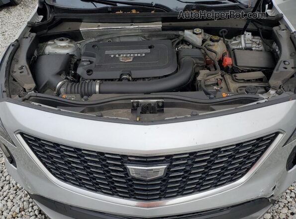 1GYFZDR45MF015877 2021 CADILLAC XT4 Серебряный Вид задней части салона