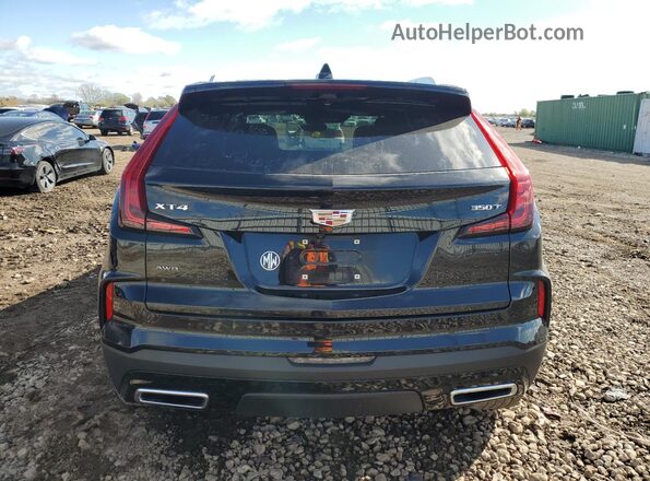 1GYFZDR47RF213464 2024 CADILLAC XT4 Черный Вид сзади