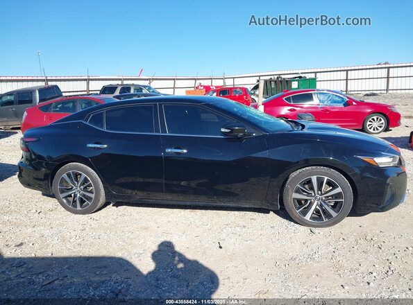 1N4AA6CV4PC510782 2023 NISSAN MAXIMA Черный Вид задней части салона