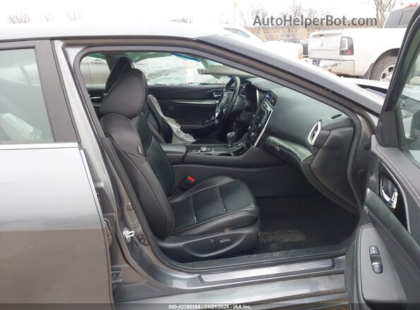 1N4AA6CV7LC373766 2020 NISSAN MAXIMA Beige Widok wnętrza z przodu