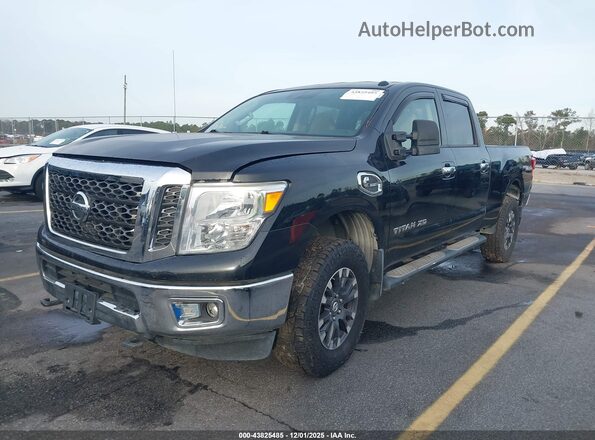 1N6BA1F3XHN570368 2017 NISSAN TITAN XD Black Przód lewy