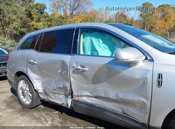 2LMHJ5AT0KBL01911 2019 LINCOLN MKT Серебряный Вид задней части салона
