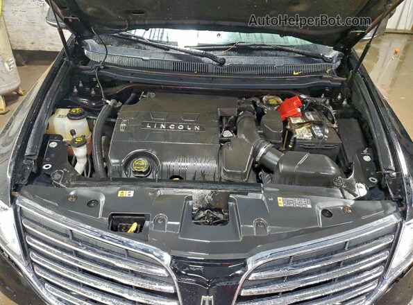 2LMHJ5NK0HBL01207 2017 LINCOLN MKT Черный Вид задней части салона