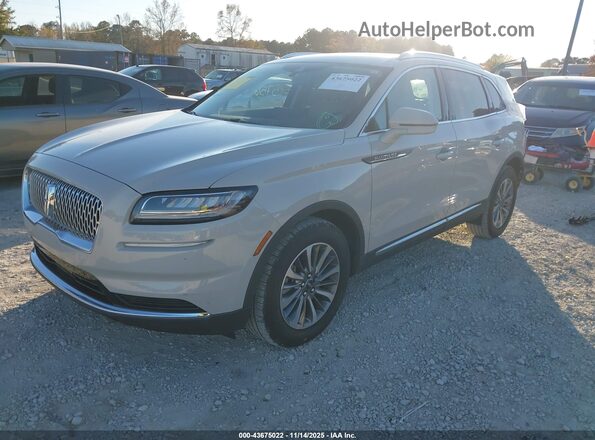 2LMPJ6J91NBL08134 2022 LINCOLN NAUTILUS Кремовый Передняя левая четверть