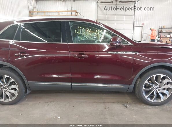 2LMPJ8K91MBL04741 2021 LINCOLN NAUTILUS Maroon Widok wnętrza 360 stopni