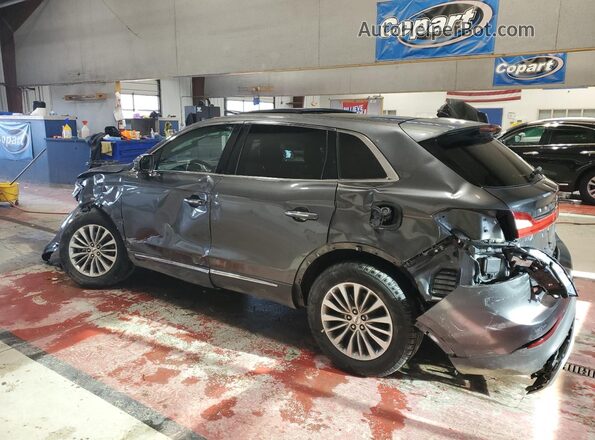 2LMPJ8KP4JBL17719 2018 LINCOLN MKX Black Trasero izquierdo