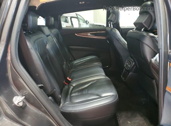 2LMPJ8KP4JBL17719 2018 LINCOLN MKX Black Vista interior trasera