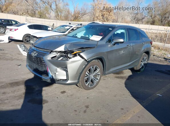 2T2BZMCA2HC056688 2017 LEXUS RX 350 Серебряный Передняя левая четверть