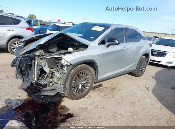 2T2BZMCA2KC196862 2019 LEXUS RX 350 Серебряный Передняя левая четверть