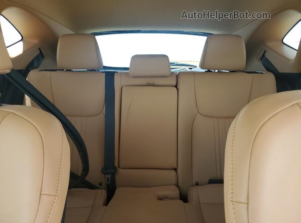 2T2GGCEZ6PC027007 2023 LEXUS NX Gold Vista de los asientos traseros