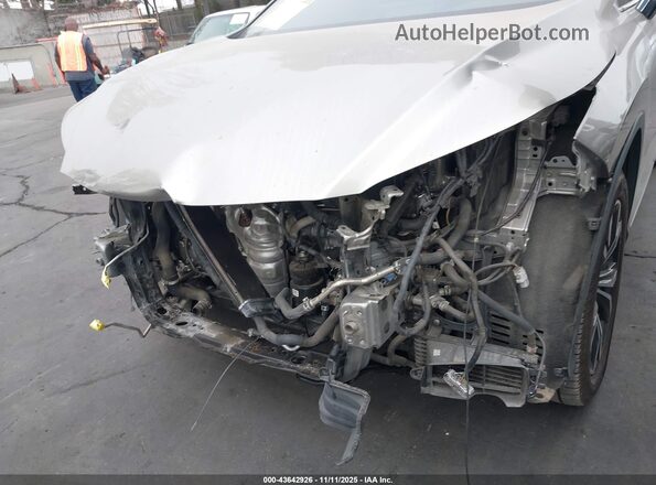 2T2HGMDA6LC051212 2020 LEXUS RX 450H Серебряный Вид задней части салона