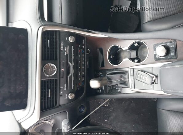 2T2HGMDA6LC051212 2020 LEXUS RX 450H Серебряный Вид панели приборов