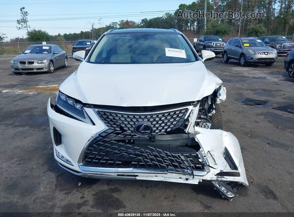 2T2JGMDA3MC064471 2021 LEXUS RX 450H Белый Вид панели приборов