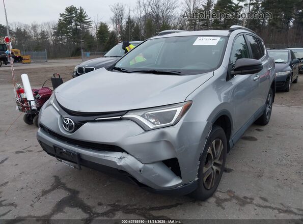 2T3BFREV8GW486806 2016 TOYOTA LE Серебряный Вид спереди