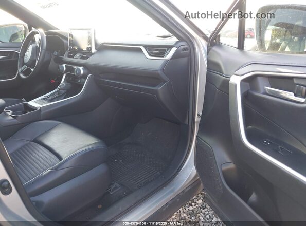 2T3E6RFV0MW021525 2021 TOYOTA RAV4 HYBRID Light Blue Вид салона спереди