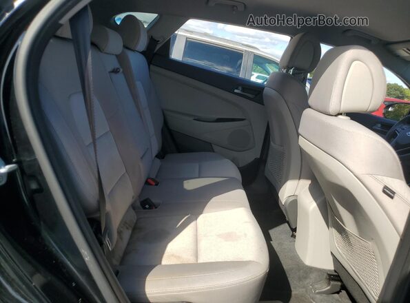 KM8J33A2XGU165002 2016 HYUNDAI TUCSON Черный Вид задней части салона