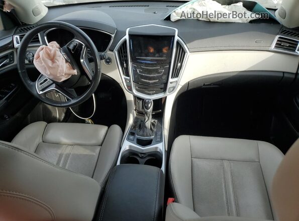3GYFNCE3XGS551176 2016 CADILLAC SRX Серебряный Вид панели приборов