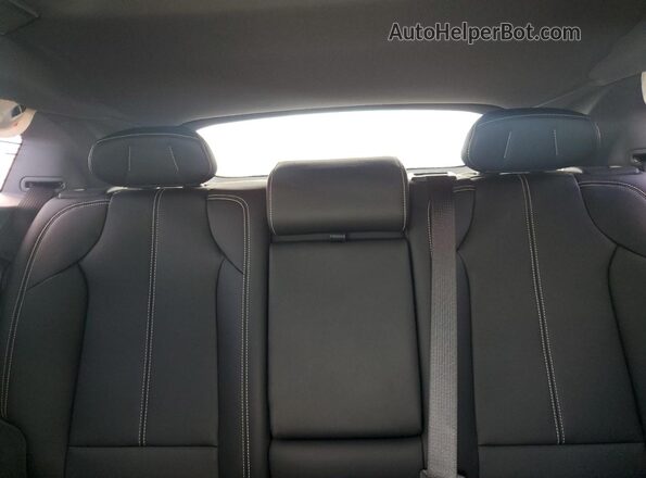3GYK3EMR0SS166188 2025 CADILLAC OPTIQ White Vista de los asientos traseros