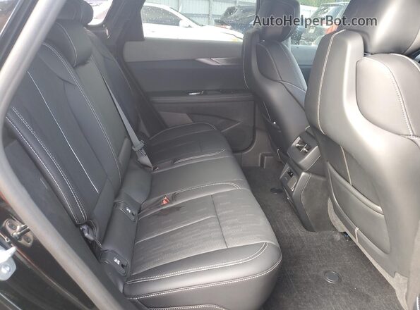 3GYK3GMR5SS210987 2025 CADILLAC OPTIQ Черный Вид задней части салона