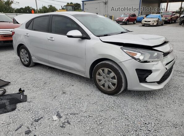 3KPA24AD0PE618654 2023 KIA RIO Серебряный Передняя правая четверть